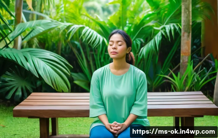 하루의 소중함을 느끼는 명상법 - A serene Malaysian woman in modest casual clothing practicing 4-7-8 breathing meditation while sitti...